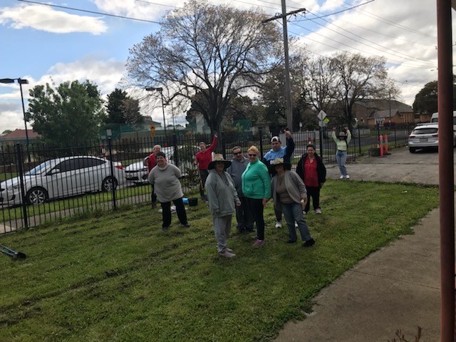 Client group in the garden at St John of God Accord's Glenroy Community Campus