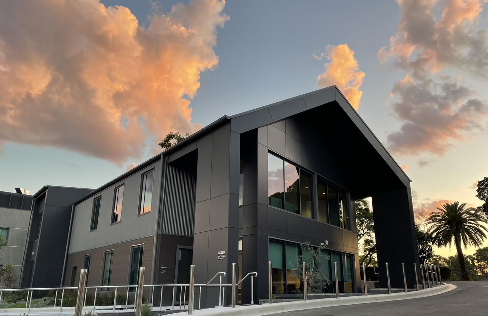 St John of God Richmond Hospital redevelopment exterior of two storey building with accessible ramp in foreground