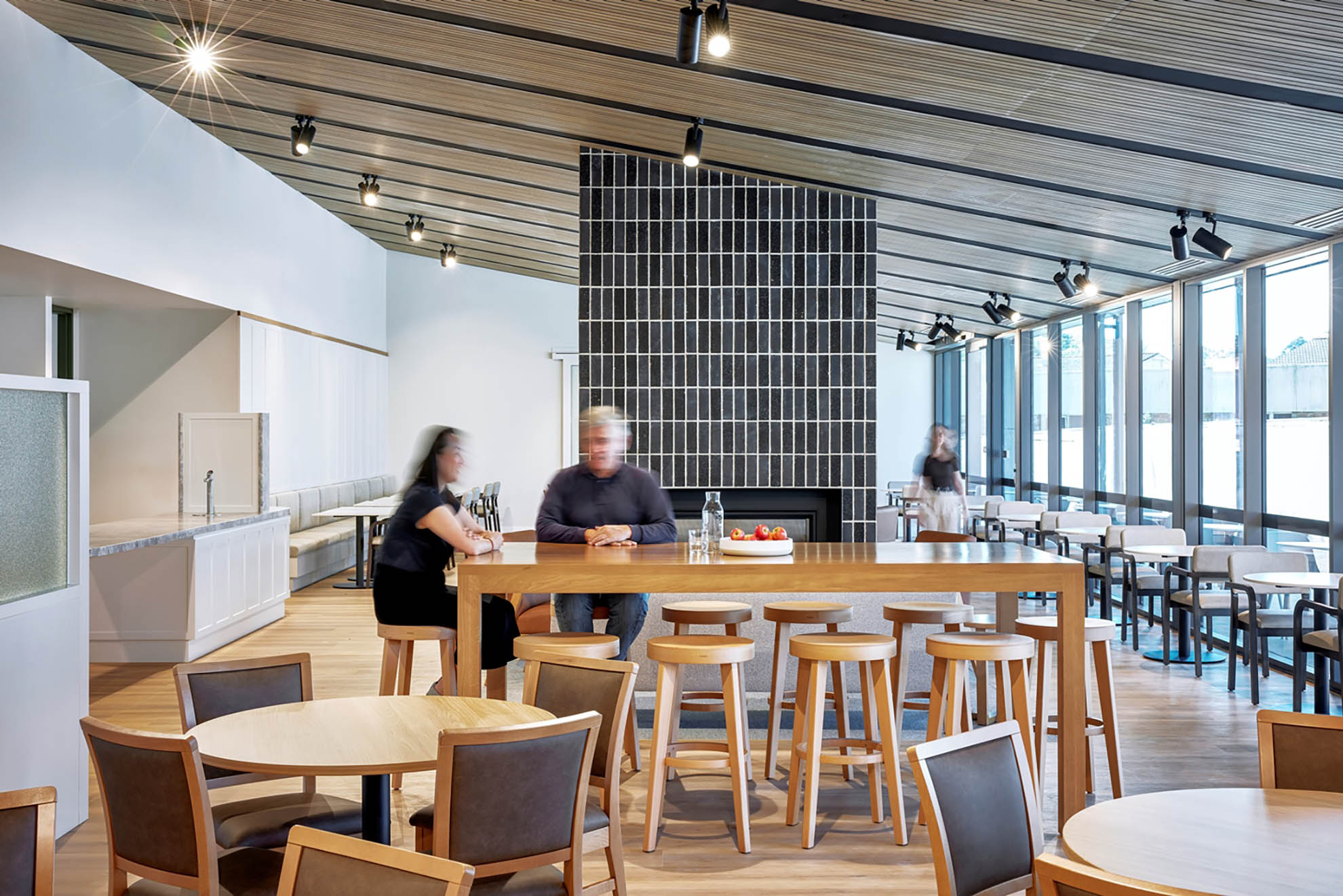 St John of God Richmond Hospital redevelopment dining area with two people seated at bench