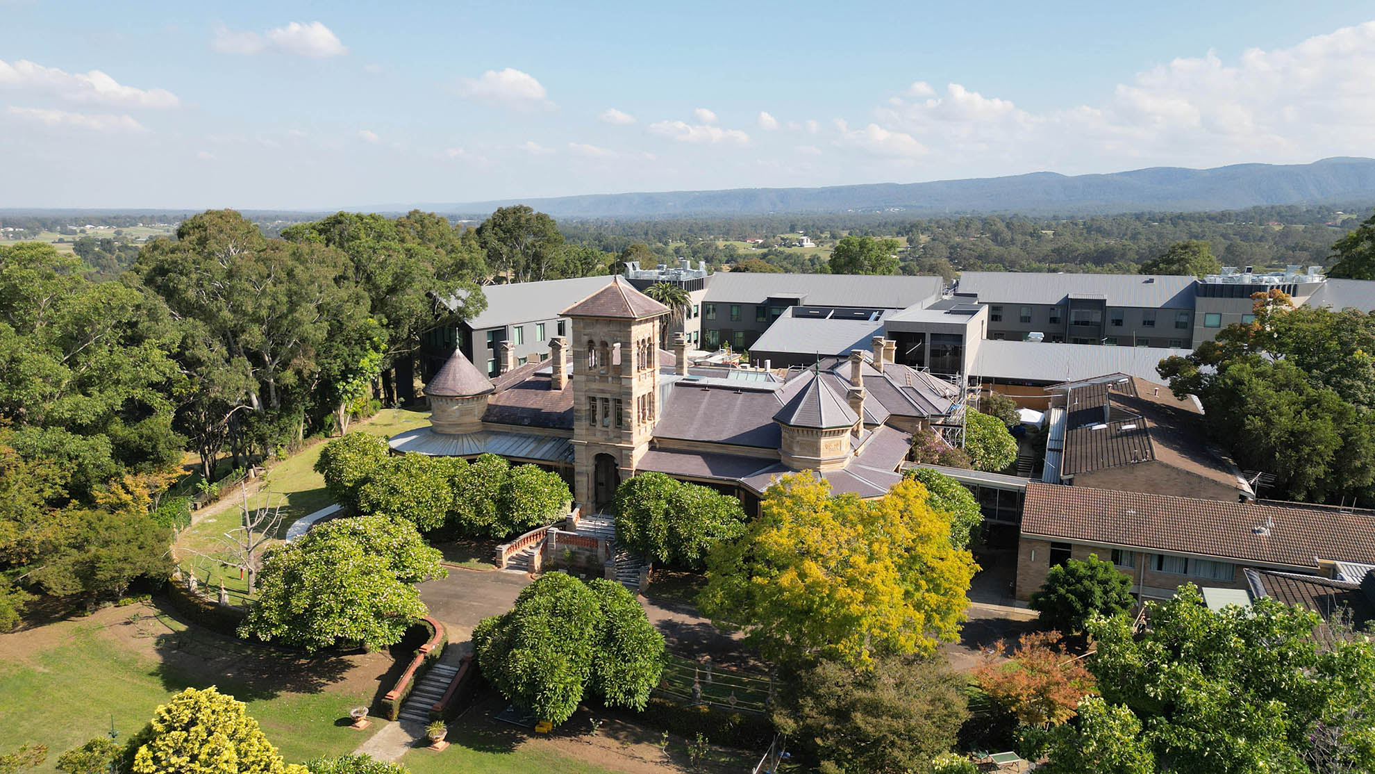 St John of God Richmond Hospital redevelopment arial photo of facade with heritage entrance in foreground and new building behind it