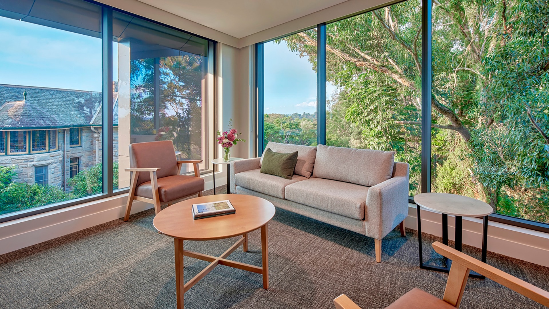 St John of God Richmond Hospital redevelopment brand new lounge seating with windows overlooking a heritage building